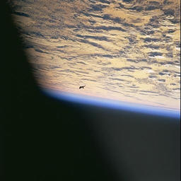Black UFO Over Earth