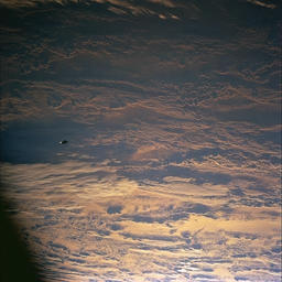 Black UFO Over Earth