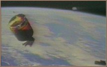 Shuttle Discovery UFO Over Earth